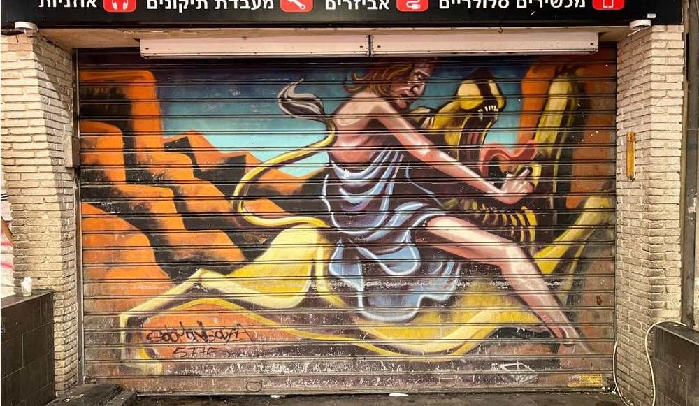 צילום של הפנים של השוק: סיור גרפיטי לילי בשוק מחנה יהודה